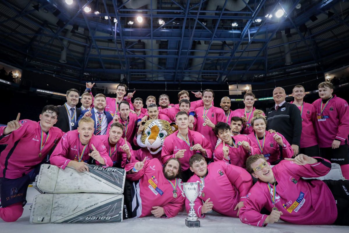 NTU's ice hockey players celebrate their win